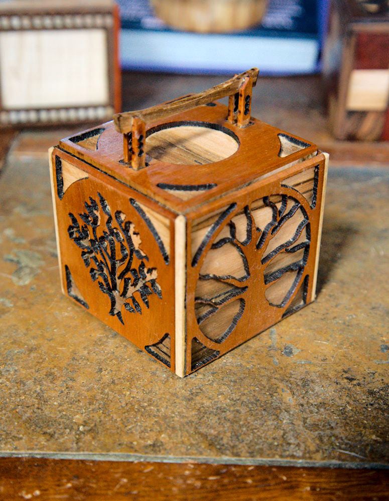 Tree-patterned container, with a tori gate on the top for some reason, why not. Cherry and maple foraged from the nearby park.