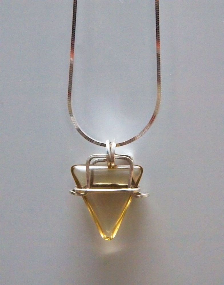 Polished citrine wrapped in square argentium wire